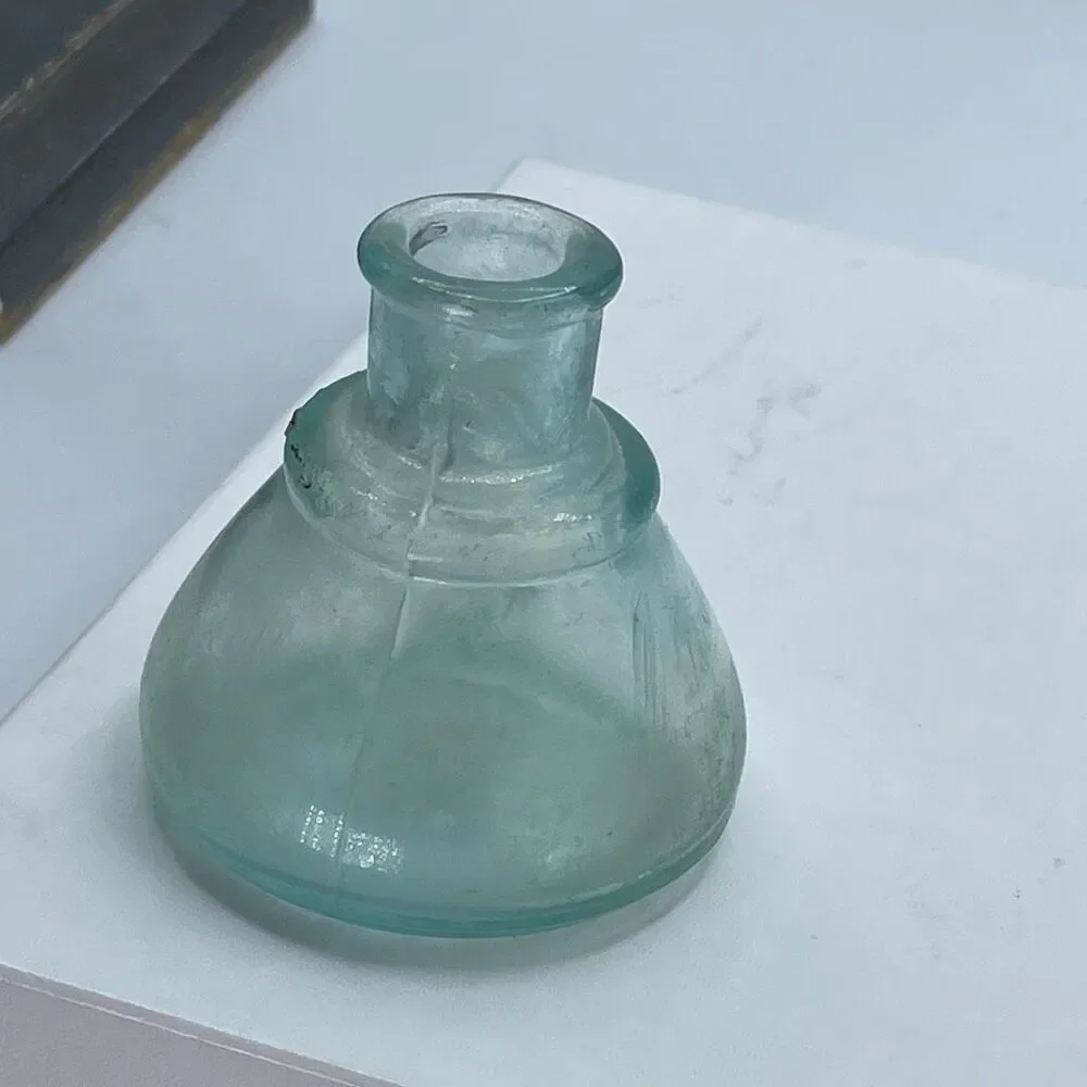 Antique Aqua -colored glass ink bottle Victorian era. Conical or umbrella shaped